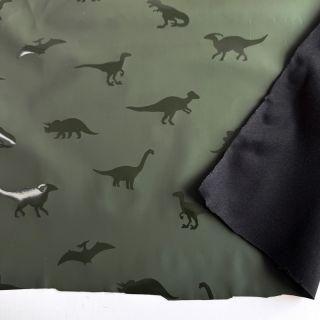 Raincoat fabric Dinosaurs dark green