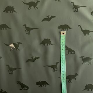 Raincoat fabric Dinosaurs dark green