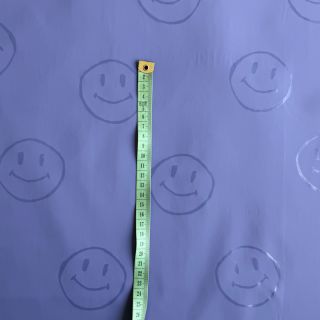 Raincoat fabric Happy faces purple